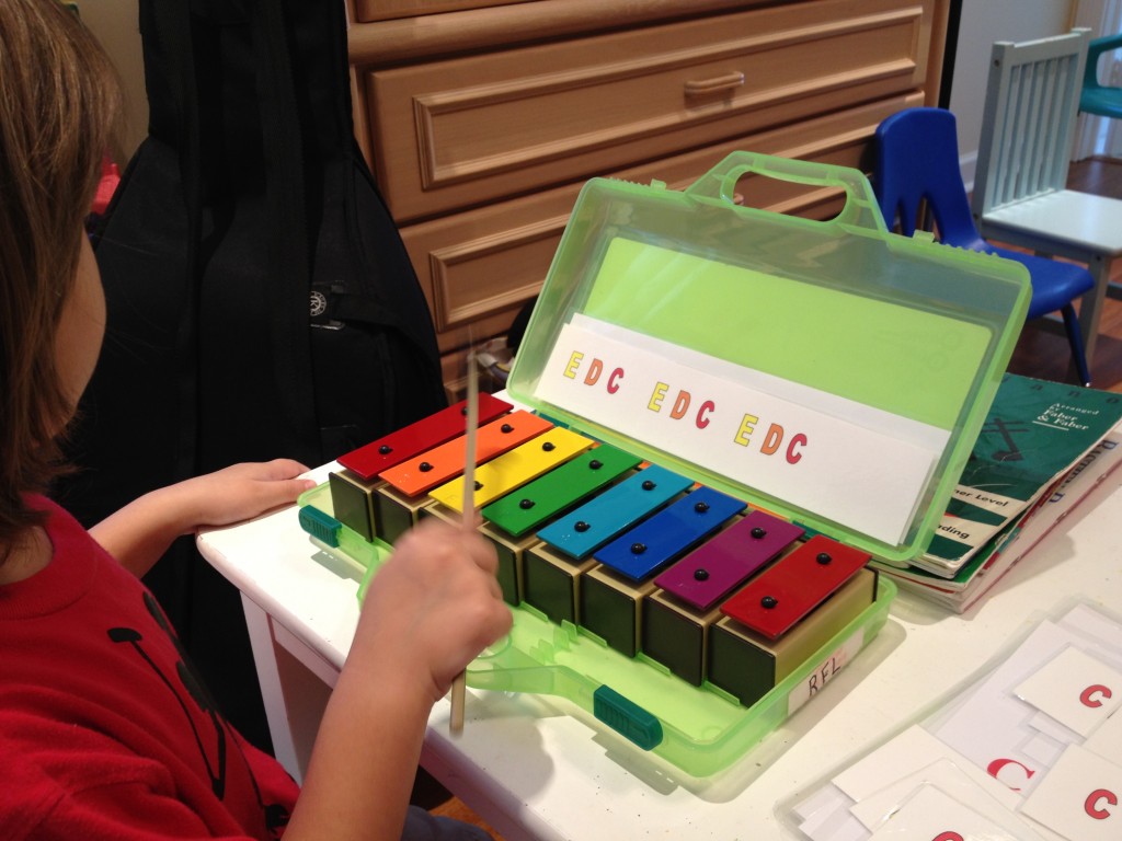 activity cube with xylophone