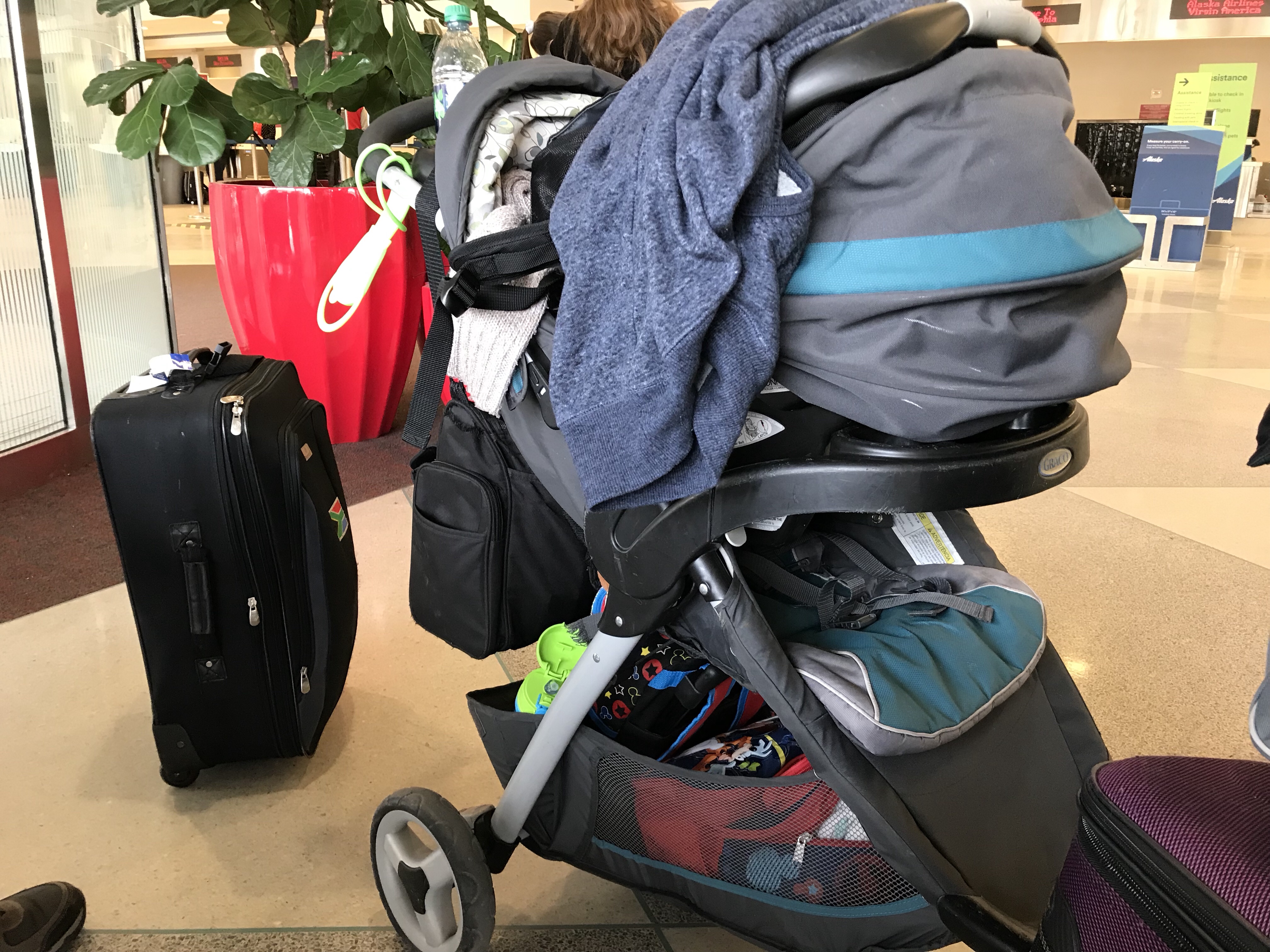 American airlines cheap stroller carry on